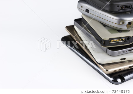Stack of smartphones Stack of smartphones 72440175
