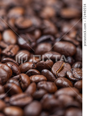 Close up fresh raw organic coffee beans top view background. 72440554