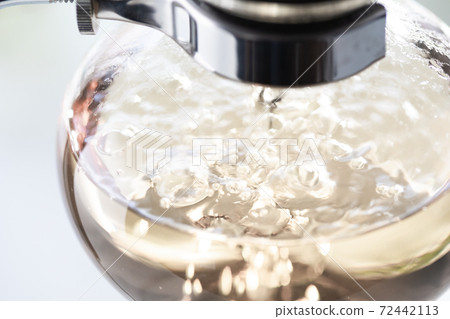 Where hot water is boiled with a coffee siphon 72442113