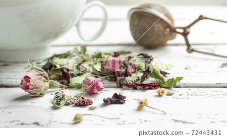 Herbal tea in a white cup 72443431