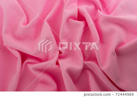 Pink fabric as a background. 72444989
