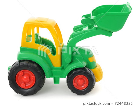 Children's plastic toy, yellow-green bulldozer isolated on white 72448385