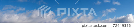 Blue sky with clouds, wide cloudscape background panorama Blue sky with clouds, wide cloudscape background panorama 72449356