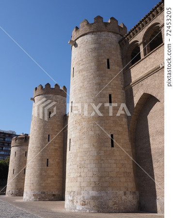 Walls of palace in european Saragossa city in Spain - vertical 72453205