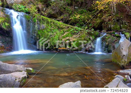 Carpathians. Skole. Waterfall on a mountain river. 72454820