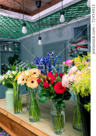 Floral shop concept . Beautiful bouquet of mixed flowers. Handsome fresh bunch. Flowers delivery. 72454913