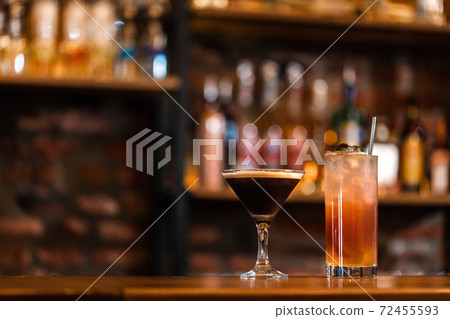 Delicious cocktails in the bar. Hot and cold cocktail with alcohol Delicious cocktails in the bar. Hot and cold cocktail with alcohol 72455593
