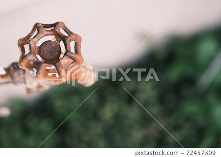 Rusted retro faucet 72457309