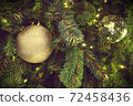 Christmas background of de-focused lights with decorated tree 72458436