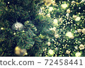 Christmas background of de-focused lights with decorated tree 72458441