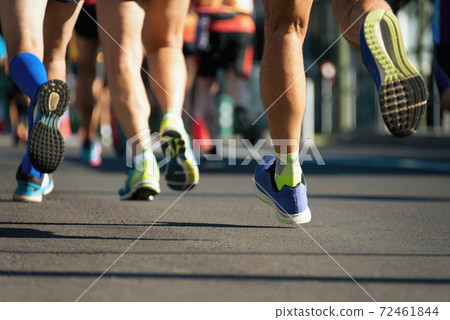 Marathon running race, runners feet on road, sport, fitness and healthy lifestyle concept 72461844