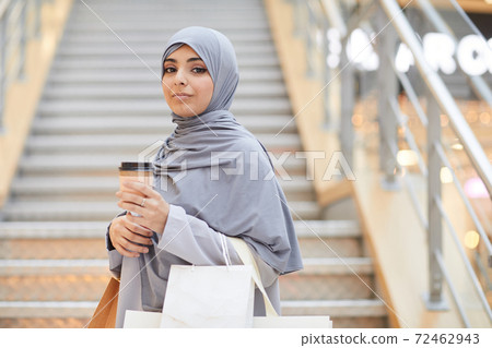 Contemporary Middle-Eastern Woman in Shopping Mall 72462943