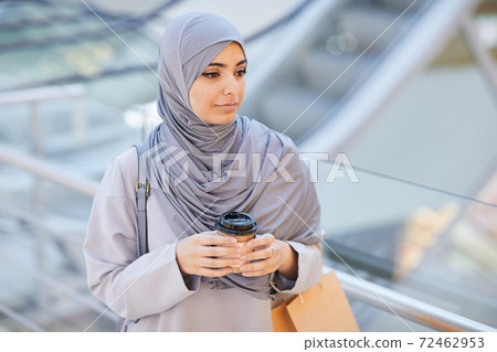 Elegant Middle-Eastern Woman in Shopping Mall 72462953