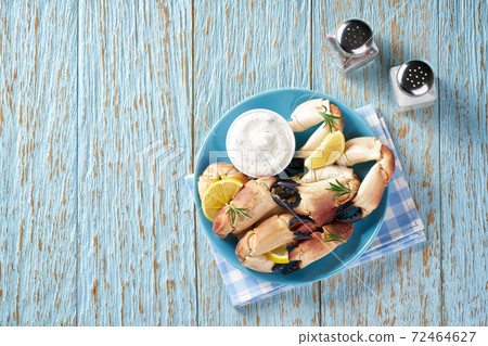 Cooked crab on the blue wooden table with copy space for text, top view. 72464627