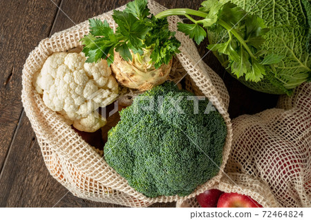 Fresh vegetables in ecological reusable mesh bags made of organic cotton - zero-waste concept Fresh vegetables in ecological reusable mesh bags made of organic cotton - zero-waste concept 72464824