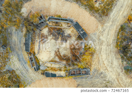 Aerial photograph of structural ruins and forest after bushfires in regional Australia 72467165