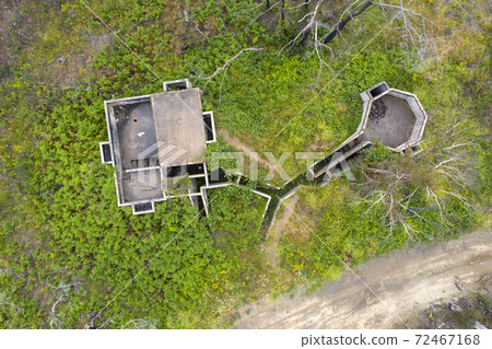 Aerial photograph of structural ruins and forest after bushfires in regional Australia 72467168