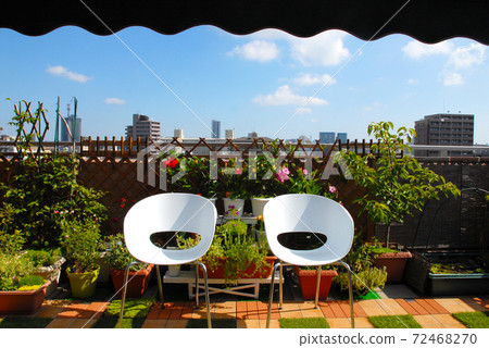 Relax on the roof balcony with a chair Relax on the roof balcony with a chair 72468270