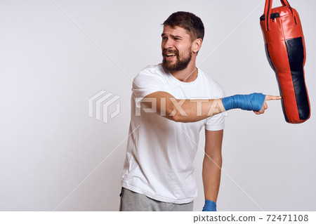 Sports car punching bag bandages on the hands of the exercise Sports car punching bag bandages on the hands of the exercise 72471108