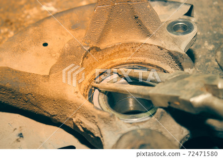 Wheel Bearings Lock Ring Removal by Pliers in Vintage Tone Wheel Bearings Lock Ring Removal by Pliers in Vintage Tone 72471580