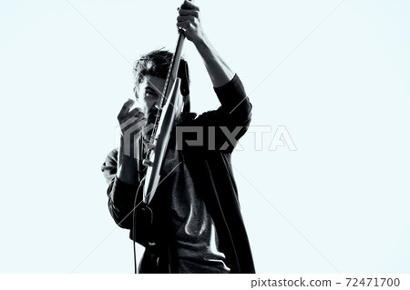 Musician guitarist performing electric guitar entertainment music Musician guitarist performing electric guitar entertainment music 72471700