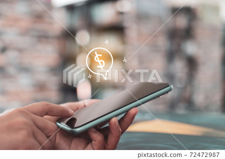 Woman use gadget mobile smartphone earn money online with dollar icon pop up. Business fintech technology on smartphone. Woman use gadget mobile smartphone earn money online with dollar icon pop up. Business fintech technology on smartphone. 72472987