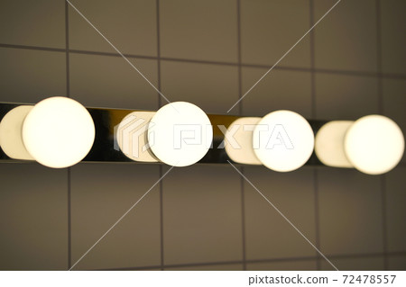 White candelabra globe bathroom bulbs. 72478557