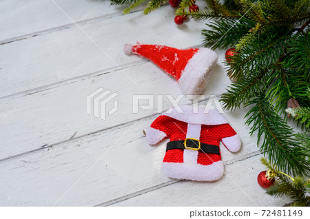 Merry Christmas and Happy New Year background. Winter season holiday decoration with gift and present. Merry Christmas and Happy New Year background. Winter season holiday decoration with gift and present. 72481149