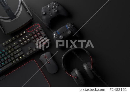 Top view of gamer workspace and gear like mouse, keyboard, joystick, headset, VR Top view of gamer workspace and gear like mouse, keyboard, joystick, headset, VR 72482161