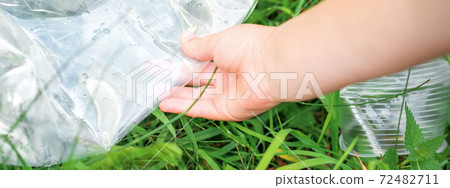 Plastic bag in little hands 72482711