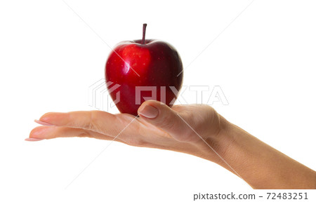 red apple in hand 72483251