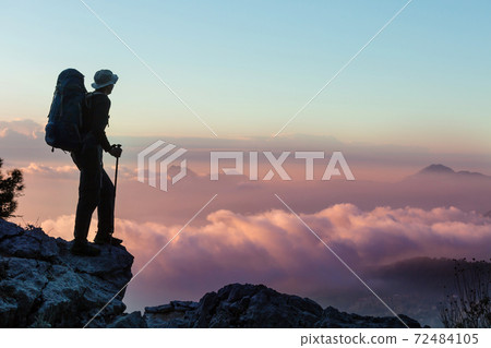 Man on the cliff 72484105