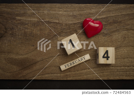February 14 on wooden cube calendar 72484563