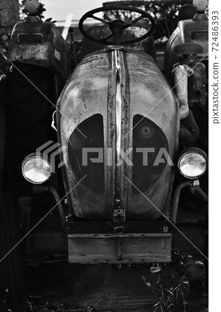 Decayed and shabby old farm equipment Decayed and shabby old farm equipment 72486393