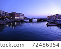 Boat mooring and bridge in Siracusa at sunset 72486954