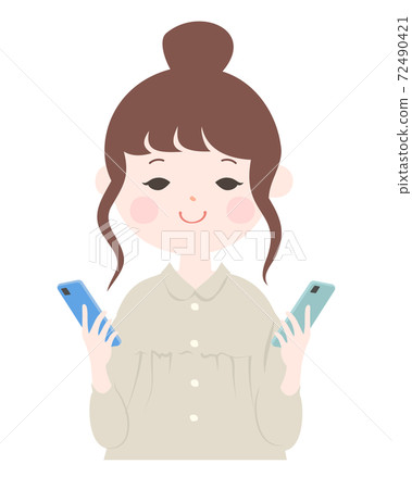 A young woman holding a smartphone in both hands, upper body [no main line] 72490421