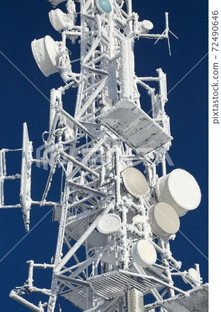 Transmitter tower frozen in winter frost Transmitter tower frozen in winter frost 72490646