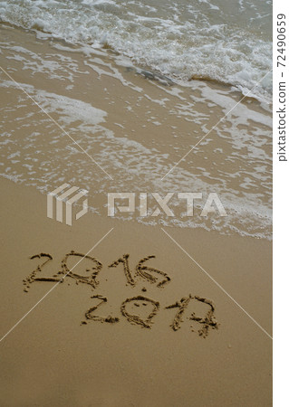 2016 and 2017 year on the sand beach 72490659