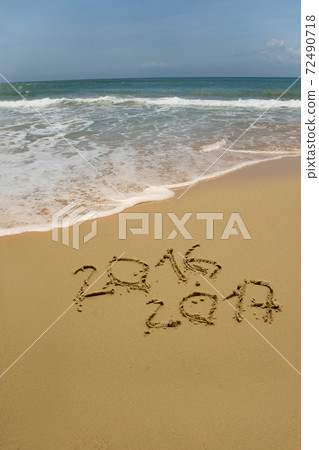 2016 and 2017 year on the sand beach 72490718