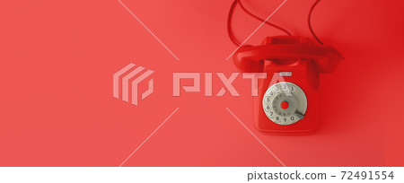 A red vintage dial telephone. A red vintage dial telephone. 72491554