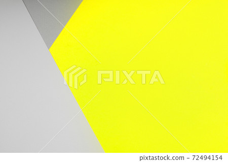 Paper background in two trendy colors of year 2021 - yellow and gray 72494154