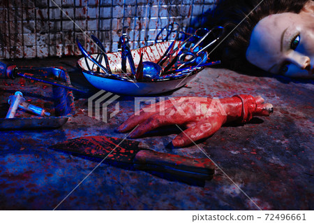 Human limbs and remains are covered in blood. Creepy and gloomy room for medical experiments 72496661