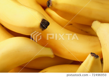 Ripe and sweet yellow bananas close up full screen Ripe and sweet yellow bananas close up full screen 72496950