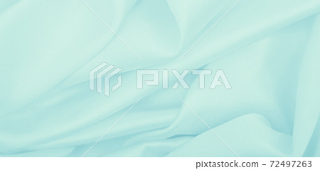 Smooth elegant blue silk or satin luxury cloth texture as abstract background. Luxurious background design Smooth elegant blue silk or satin luxury cloth texture as abstract background. Luxurious background design 72497263