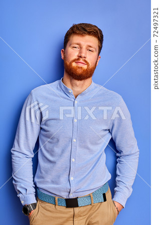 redhead bearded male in shirt posing at camera redhead bearded male in shirt posing at camera 72497321