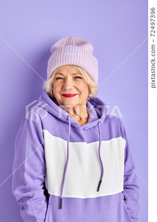 cool modern elderly woman in pullover 72497396