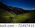 Hiking in Austria with amazing view. Beautiful mountings. 72497418