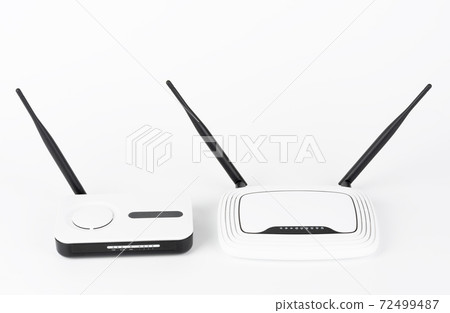 Two wifi routers, wireless devices with one and two antennas on white background. 72499487