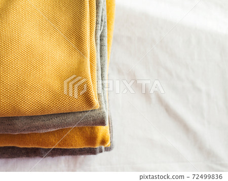 Yellow illuminated color and gray winter sweaters Yellow illuminated color and gray winter sweaters 72499836