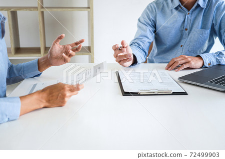Young woman candidate explaining about his profile to executive manager sitting in during job Interview, interview the job and hiring 72499903